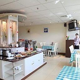Sala colazione nel ristorante Longshaoheng Mansion Hotel Fotos
