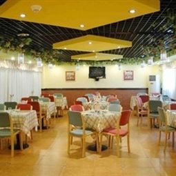 Frühstücksraum im Restaurant Home Inn Haibin Park Fotos
