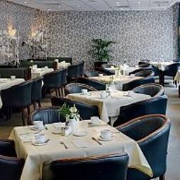 Salle du petit-déjeuner située dans le restaurant Best Western Grand City Fotos