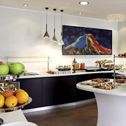 Salle du petit-déjeuner située dans le restaurant Mercure Napoli Angioino Centro Fotos