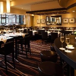 Sala de desayuno en el restaurante Mövenpick Fotos