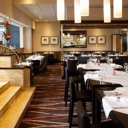 Sala de desayuno en el restaurante Mövenpick Fotos