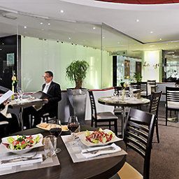 Sala de desayuno en el restaurante Mercure Strasbourg Palais des Congres Fotos