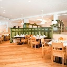Sala colazione nel ristorante Alphotel Fotos