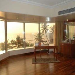 Camera Ramada Plaza Palm Grove Fotos