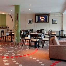 Salle du petit-déjeuner située dans le restaurant Leonardo Airport Fotos