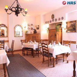Salle du petit-déjeuner située dans le restaurant Hahn Fotos