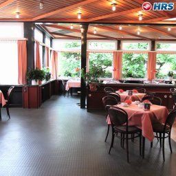 Sala de desayuno en el restaurante Böll Fotos