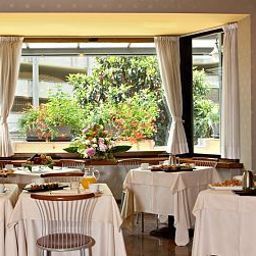 Sala de desayuno Atahotel Executive Fotos