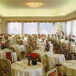 Sala de desayuno en el restaurante Royal Hotel Fotos