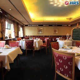 Salle du petit-déjeuner située dans le restaurant Haus Wilkens Fotos