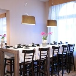 Salle du petit-déjeuner située dans le restaurant Leonardo Boutique Savoy Munich Fotos