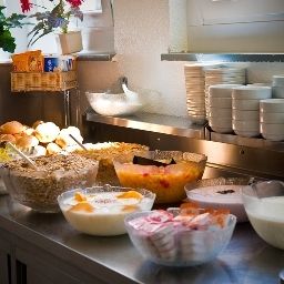 Sala colazione nel ristorante haus international Fotos