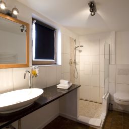 Salle de bains Romantisches Hotel Traube Fotos