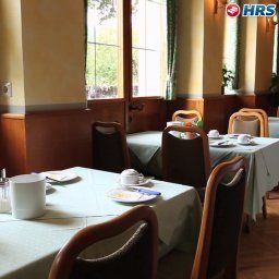 Salle du petit-déjeuner située dans le restaurant Schwarzes Lamm Fotos