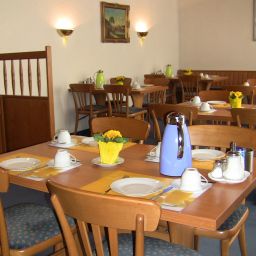 Breakfast room within restaurant Hansa Fotos
