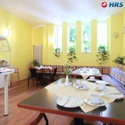 Salle du petit-déjeuner située dans le restaurant Central Fotos