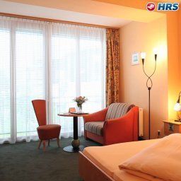 Номер Schweizerhof Sport-Beautyhotel Fotos