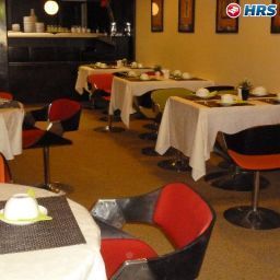 Salle du petit-déjeuner Helios Fotos