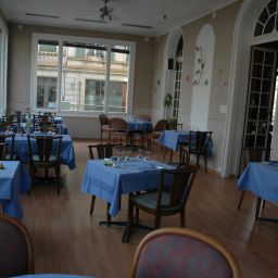 Sala colazione nel ristorante De Famille Fotos