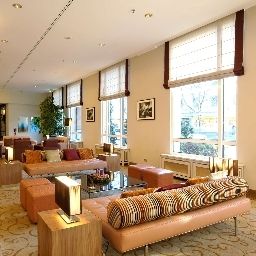 Холл Hilton Munich City Fotos