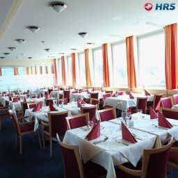 Salle du petit-déjeuner située dans le restaurant Austria Trend Hotel Europa Salzburg Fotos