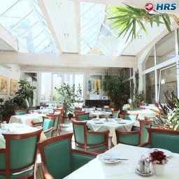 Salle du petit-déjeuner située dans le restaurant Mosser Fotos