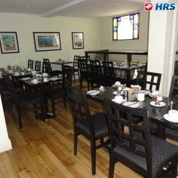 Salle du petit-déjeuner située dans le restaurant Byron Capricorn Fotos