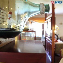 Salle du petit-déjeuner située dans le restaurant Butjadinger Tor Landhotel Fotos
