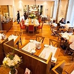 Salle du petit-déjeuner Schweizerhof Fotos