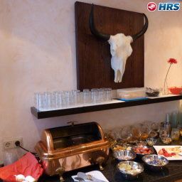Salle du petit-déjeuner située dans le restaurant Parkhotel Viktoria Fotos