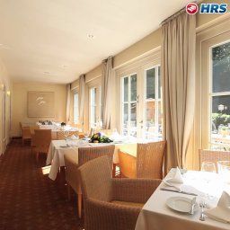 Salle du petit-déjeuner située dans le restaurant Hirschsprung Landhaus Fotos