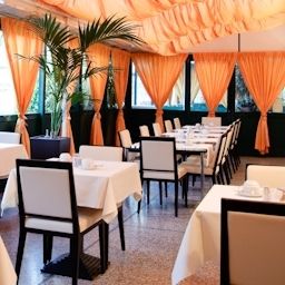 Salle du petit-déjeuner Novo Hotel Rossi Fotos