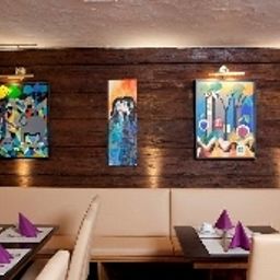 Breakfast room within restaurant Arthotel Fotos