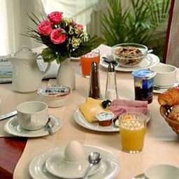 Salle du petit-déjeuner Alina Fotos
