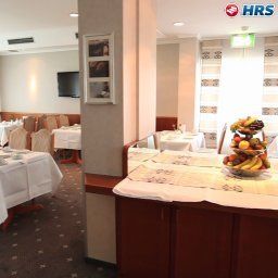 Salle du petit-déjeuner située dans le restaurant Alina Fotos