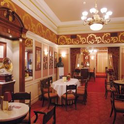 Salle du petit-déjeuner située dans le restaurant Grand Fotos