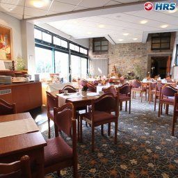 Sala de desayuno en el restaurante Bachmühle Fotos