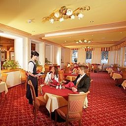 Salle du petit-déjeuner située dans le restaurant Alpenhof Fotos