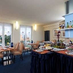 Sala de desayuno Elite Fotos