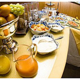 Sala de desayuno en el restaurante Freye Garni Fotos