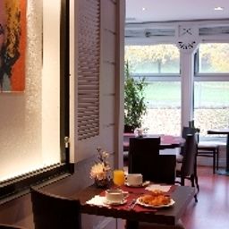 Salle du petit-déjeuner située dans le restaurant Quality Hotel Golf Rosny Sous Bois Fotos