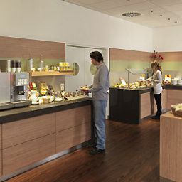 Salle du petit-déjeuner située dans le restaurant ibis Aachen Hauptbahnhof Fotos