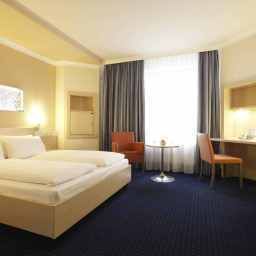 Chambre pour voyageurs d'affaires InterCityHotel Fotos