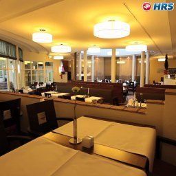 Sala de desayuno en el restaurante Best Western Premier Villa Stokkum Fotos
