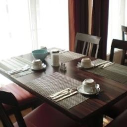 Salle du petit-déjeuner Stadt Friedberg Garni Fotos