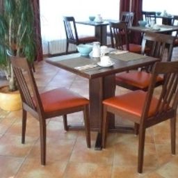 Salle du petit-déjeuner Stadt Friedberg Garni Fotos