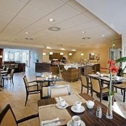 Salle du petit-déjeuner située dans le restaurant President Fotos