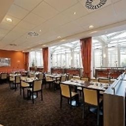 Salle du petit-déjeuner située dans le restaurant President Fotos