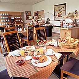 Sala de desayuno Econtel Fotos
